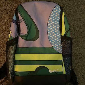 Black/green/purple Nike backpack with side pockets